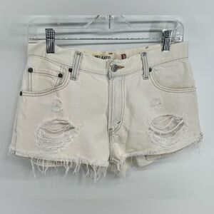 Levi’s white distressed cutoff denim shorts size 29